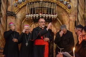 Cardinal Pierbattista Pizzaballa, Latin patriarch of Jerusalem, imparts the blessing in front of the aedicule of the Holy Sepulcher on Friday, Oct. 27, 2023, where Jesus’ tomb is venerated. Here ends the Way of the Cross that the Franciscan friars celebrate every Friday.