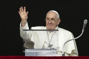 Pope Francis waves to more than 20,000 faithful at St. Peter's Square on Nov. 12.