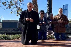 Bishop Joseph Strickland, who was removed as the leader of the Diocese of Tyler, Texas, by Pope Francis on Nov. 11, leads the recitation of the Rosary outside the site of the U.S. bishops' fall assembly in Baltimore on Nov. 14.