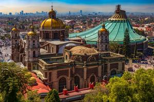 The old and new basilicas of Our Lady of Guadalupe are seen from Tepeyac Hill in Mexico City.