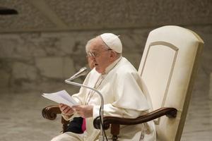 Pope Francis delivers his general audience address to pilgrims in the Paul VI Audience Hall at the Vatican on Dec. 27, 2023.