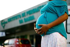 A pregnant woman is seen in front of the Iperba maternity hospital in the Salvador, Brazil. 