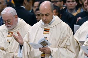 Cardinal Víctor Manuel Fernández (r), prefect of the Dicastery for the Doctrine of the Faith, attends a Mass at St. Peter’s Basilica for the Feast of Our Lady of Guadalupe on Dec. 12.