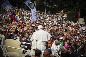 Pope Francis waves from the popemobile prior to presiding over the Holy Rosary prayer with sick young people at the Chapel of Apparitions in the Sanctuary of Our Lady of Fatima. 