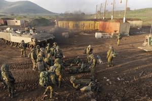 Israeli combat reservists and tank forces take part in training drills on the Lebanese front in the Israeli-controlled Golan Heights, Thursday, Jan. 4, 2024. 