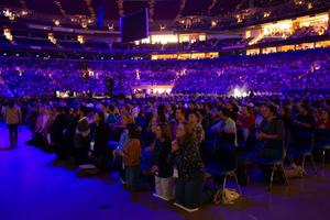 Approximately 24,000 people participate in Eucharistic adoration at the SEEK24 conference Jan. 3, 2024, in St. Louis.