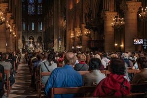 Catholics attend Mass at the Cathedral of Notre Dame in Paris, France. 
