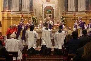 Cardinal Gerhard Müller (c) and Father Joseph Hamilton (l), personal secretary to the late Cardinal George Pell, were among the priests celebrating the Jan. 10, 2024, Mass held on the first anniversary of the cardinal's death.