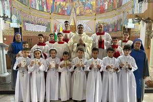 Eight children received their first Communion at Holy Family Church on Jan. 7 in northern Gaza.