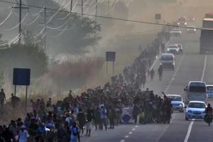 Migrants take part in a caravan toward the border with the United States in Arriaga community, Chiapas State, Mexico, on Jan. 8. 