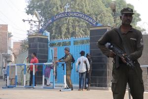 Security forces guard St. John’s Catholic Church in Youhanabad, Lahore, Pakistan, in 2019.