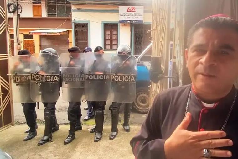 Bishop José Álvarez Lagos surrounded by police officers on Aug. 4, 2022.