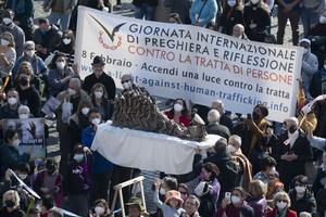 Talitha Kum members hold a sculpture of St. Josephine Bakhita in St. Peter's Square on Feb. 6, 2022.