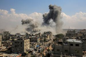 Smoke rises after Israeli air strikes of the city of Rafah in the southern Gaza Strip, October 10, 2023.