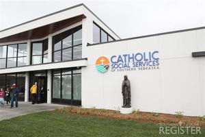 The statue of the Blessed Mother pictured before the incident on its pedestal in front of the headquarters of Catholic Social Services of Southern Nebraska.