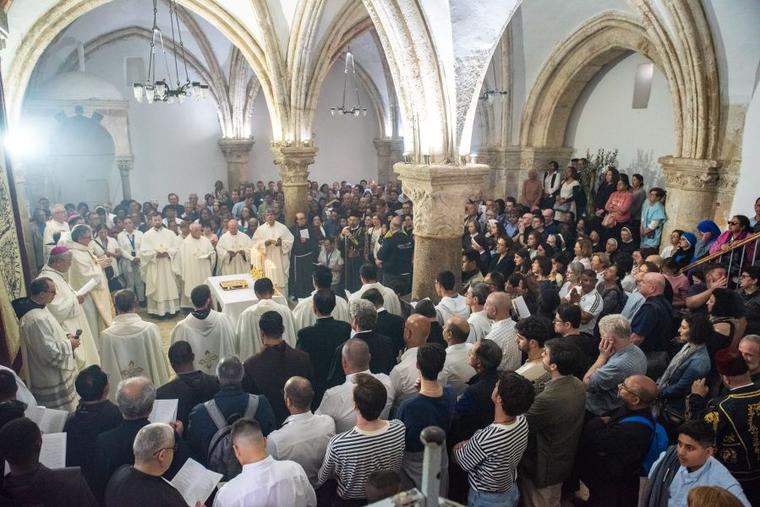 The Catholic faithful gathered in the Cenacle in Jerusalem for the Mass of the Lord's Supper that the Franciscan friars celebrated on Holy Thursday 2024. The Cenacle is at the center of strong tensions and disputes regarding ownership and rights of access and celebration. An ancient tradition places King David’s tomb here; and over the centuries Jews and Muslims have leveraged this to first expel the Franciscans and then to prevent Christian worship, which they deemed sacrilegious.