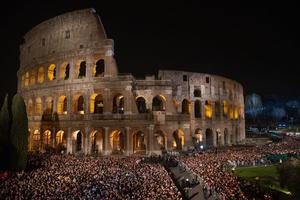 Tens of thousands gather outside of the Colosseum in Rome for the Via Crucis, the Way of the Cross, on Good Friday 2024.