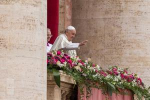 Pope Francis gives his urbi et orbi Easter blessing from the central loggia of St. Peter’s Basilica on March 31, 2024.