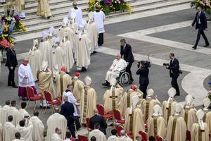 Pope Francis greets cardinals and bishops during the Easter Mass in St. Peter's Square on March 31.