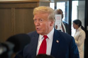 Former U.S. President Donald Trump speaks to the media during a visit to a Chick-fil-A restaurant on April 10, 2024 in Atlanta, Georgia. 