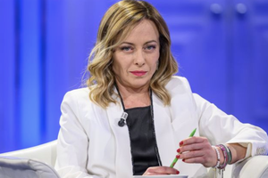 Italian Prime Minister Giorgia Meloni is seen on the set of the TV show ‘Porta a Porta’ at Rai Studios, on April 4, in Rome. 