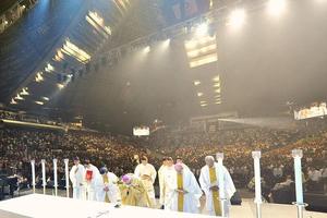 Cardinal William Goh of Singapore celebrates Mass at the city-state's Indoor Stadium on July 4, 2015.