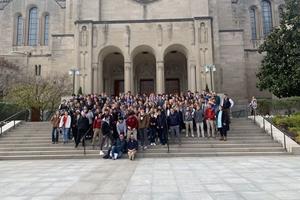 Students participating in the CEDE workshop for St. John's College High School gather for a group photo at the basilica at Catholic University of America in Washington, D.C., in November 2022.