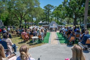 Families, donors, and others gather with Bishop Erik Pohlmeier for the dedication of the “Precious Ones Baby Mausoleum” at the San Lorenzo Cemetery in St. Augustine, Florida, on April 23, 2024.