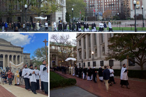 Father Roger Landry, holding the Eucharist, leads the Eucharistic procession on the Columbia University campus on Nov. 12, 2023.