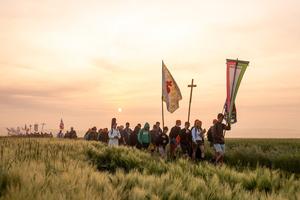 The pilgrims walk from dusk to dawn.