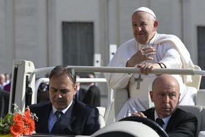 Pope Francis greets pilgrims as he arrives at his general audience on Wednesday, May 29,  2024, in St. Peter’s Square at the Vatican.
