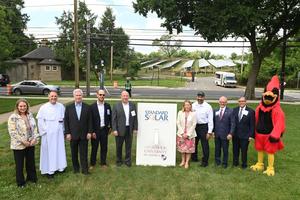 The Catholic University of America President Peter Kilpatrick (next to mascot) with Standard Solar, university, and government leaders on June 3, 2024.
