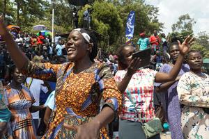 Joyful women attend the Martyrs’ Day Mass on June 3.