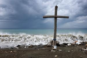 Waves crash along a beach before the arrival of Hurricane Beryl on July 3 in Kingston, Jamaica.
