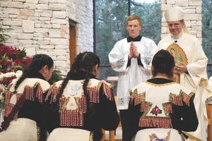 Archbishop Gustavo García-Siller of San Antonio blesses matachine dancers during a celebration on the feast of Our Lady of Guadalupe. He believes that Hispanics — immigrants especially — will help bring new life into the Church.