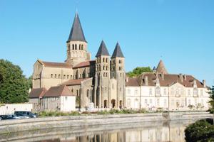 Roman Basilica of the Sacred Heart of Paray-le-Monial and cloister. View from the Bourbince River, 2023.