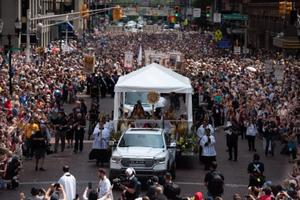 Beautiful witness: The Eucharist and the crowd for the procession as part of the National Eucharistic Congress in Indianapolis. 