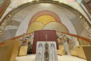 The Knights of Columbus used a paper cover to temporarily cloak artwork created by Father Marko Rupnik at the St. John Paul II National Shrine in Washington, D.C., on Tuesday, July 23.