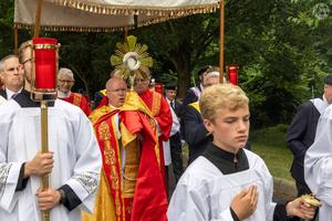 Father Roger Landry carries Christ outside of St. Paul Church in the Diocese Columbus, Ohio, as part of the Seton Route of the National Eucharistic Pilgrimage. 