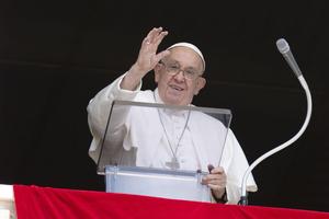 Pope Francis waves to pilgrims gathered in St. Peter's Square for his Angelus address on Aug. 4, 2024.