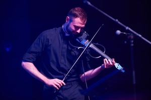 Father Kevin Lenius, a priest from the Diocese of San Angelo, Texas, takes part in the “Concert for Life” playing the electric violin.