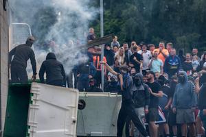 Protesters attempt to enter the Holiday Inn Express Hotel, which is housing asylum seekers, on Aug. 4, 2024, in Rotherham, United Kingdom. 