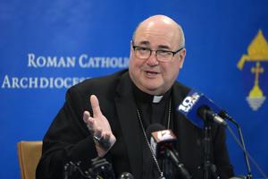 Boston Archbishop-elect Richard Henning faces reporters during a news conference on Aug. 5 in Braintree, Massachusetts. 