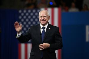 Democratic vice-presidential candidate Minnesota Gov. Tim Walz greets the audience at Temple University’s Liacouras Center in Philadelphia Aug. 6.