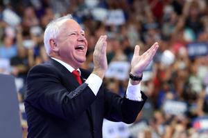 Minnesota Governor and Democratic vice presidential candidate Tim Walz  gestures during a campaign rally at the Thomas and Mack Center, University of Nevada in Las Vegas, Nevada, on August 10, 2024. 