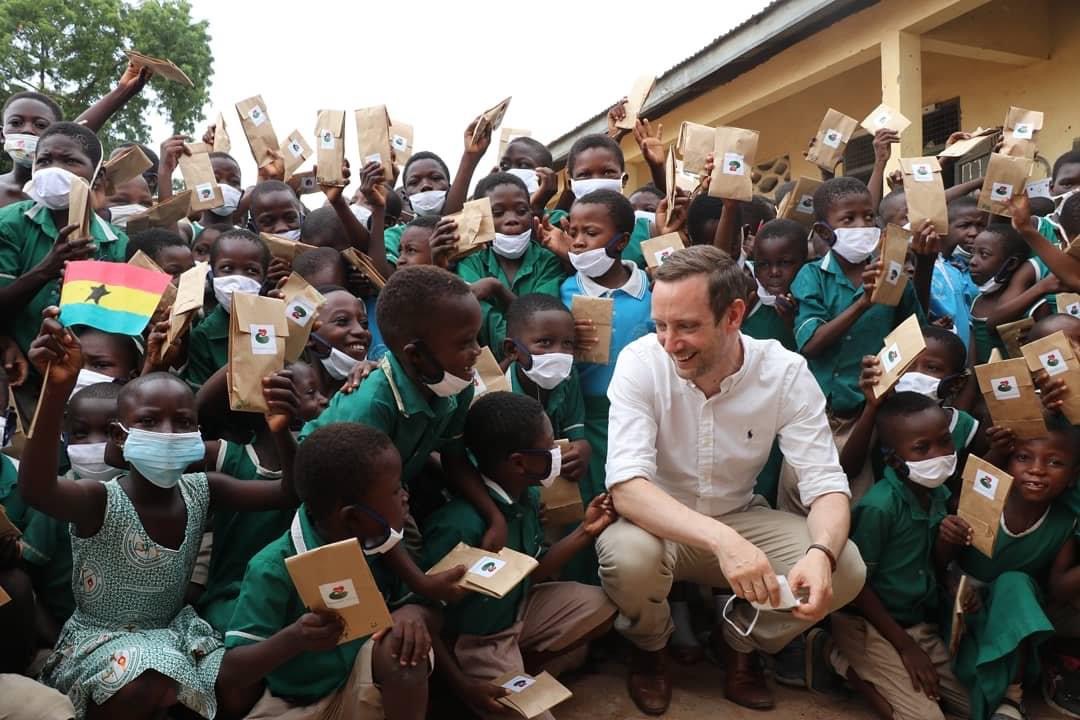 Tristan Azbej meets with children on a recent mission trip.