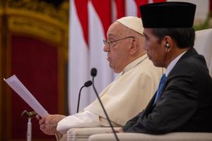 Pope Francis speaking next to Indonesian President Joko Widodo at the meeting with the authorities, civil society and the diplomatic corps in Jakarta on Sep 4, 2024.
