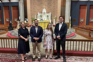 L-R: Elizabeth L’Arrive, faculty; Michael Shick, president; Emma Adams, student; and Matt Story, advisory board, at Prince of Peace Catholic Church in Taylors, South Carolina. 