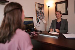 Cultivating job skills is important to colleges, including Christendom College in Front Royal, Virginia, where career adviser Kristin Stephens regularly meets with students to discuss the career search. 