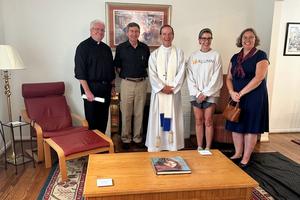 Bishop Michael Burbidge of Arlington, Virginia (center), at his blessing of Mary’s Comfort maternity home on Aug. 9, 2024. More maternity homes are popping up across the United States to house and support pregnant mothers and their babies since Roe v. Wade was overturned by the U.S. Supreme Court in 2022.